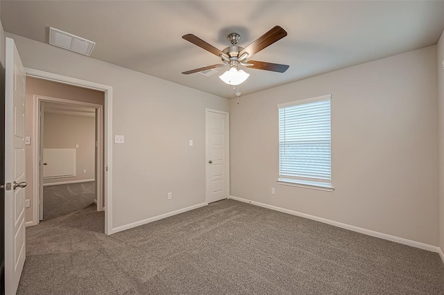 unfurnished bedroom featuring visible vents, baseboards, and carpet flooring