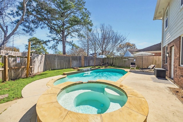 view of pool featuring a patio area, an in ground hot tub, and a fenced backyard