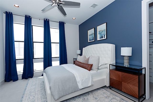 bedroom featuring recessed lighting, visible vents, carpet flooring, and a ceiling fan