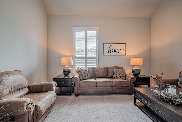 living room featuring light carpet