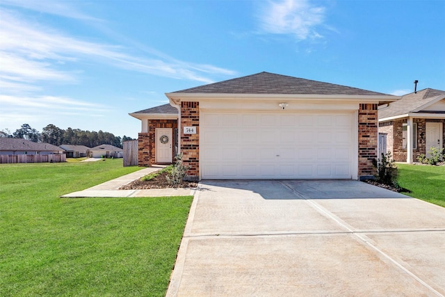 744 Hackberry Branch Ct, Magnolia, TX 77354 - ranch-style house with concrete driveway, a front lawn, a garage, and brick siding