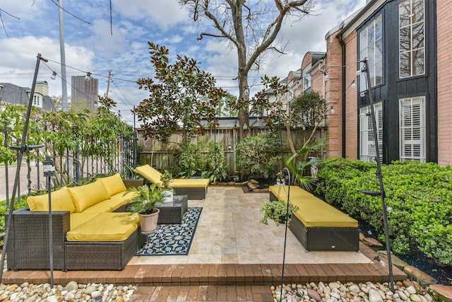 view of patio / terrace featuring fence private yard and outdoor lounge area