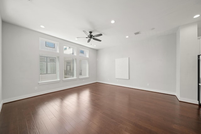 unfurnished room featuring recessed lighting, a ceiling fan, baseboards, and dark wood-style flooring