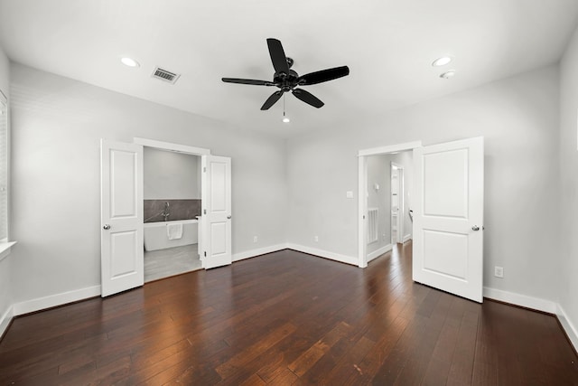 unfurnished bedroom with recessed lighting, baseboards, visible vents, and dark wood-style flooring