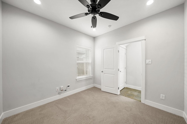 carpeted empty room featuring recessed lighting, baseboards, and ceiling fan