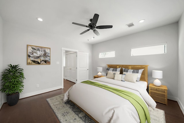 bedroom with visible vents, recessed lighting, baseboards, and wood finished floors