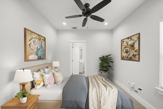 bedroom with visible vents, recessed lighting, ensuite bath, and baseboards