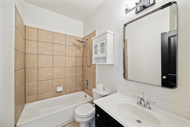 bathroom with shower / washtub combination, toilet, vanity, and a textured wall