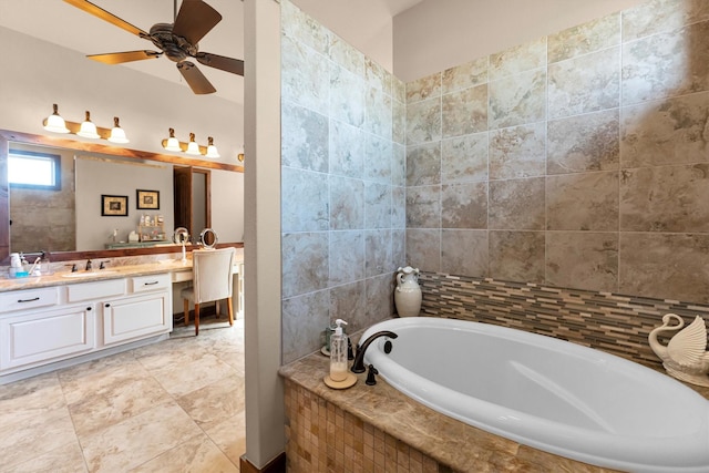 bathroom featuring vanity, a garden tub, and tile patterned floors