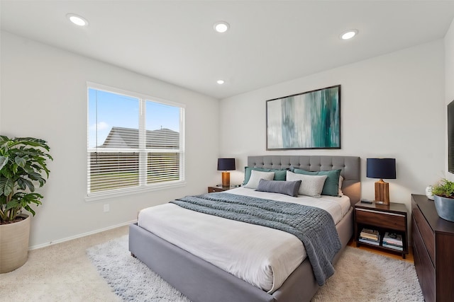 carpeted bedroom with recessed lighting and baseboards