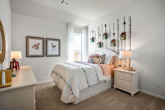 carpeted bedroom with visible vents, baseboards, and vaulted ceiling