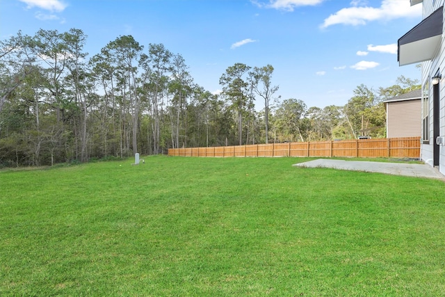 view of yard featuring fence