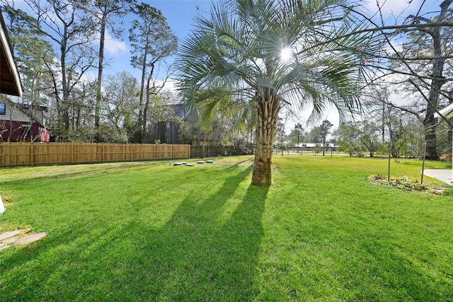 view of yard with fence