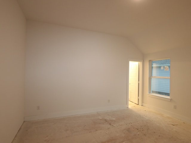 8518 Pier Cove Dr, Cypress, TX 77433 - spare room with lofted ceiling and baseboards
