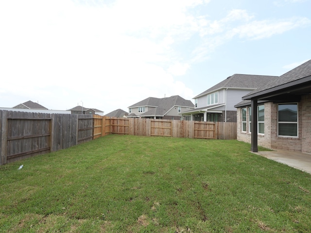 8518 Pier Cove Dr, Cypress, TX 77433 - fenced backyard with a patio area