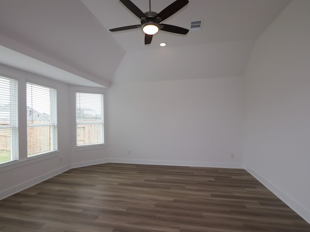 8518 Pier Cove Dr, Cypress, TX 77433 - empty room with vaulted ceiling, ceiling fan, dark wood-type flooring, and recessed lighting