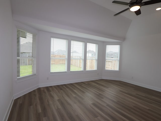 8518 Pier Cove Dr, Cypress, TX 77433 - empty room with dark wood-style flooring, ceiling fan, and lofted ceiling
