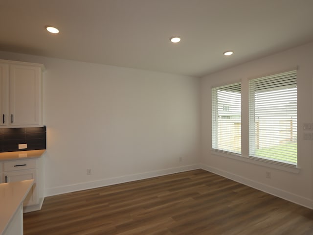 8518 Pier Cove Dr, Cypress, TX 77433 - unfurnished living room featuring dark wood-type flooring and recessed lighting
