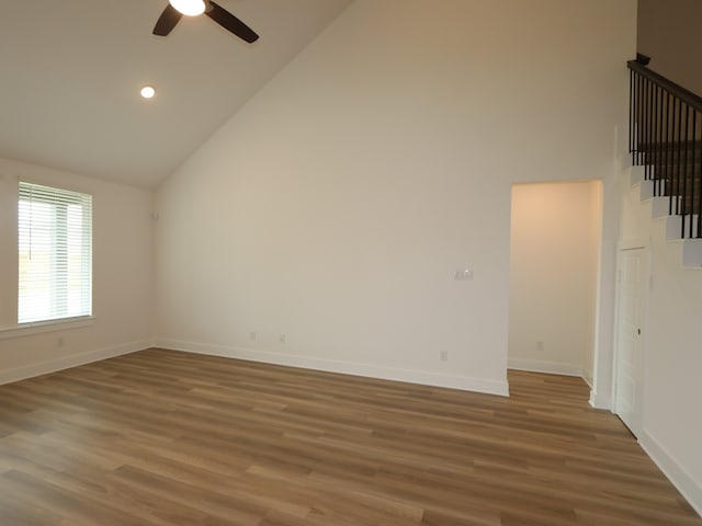 8518 Pier Cove Dr, Cypress, TX 77433 - bonus room with high vaulted ceiling, a ceiling fan, wood finished floors, stairway, and recessed lighting