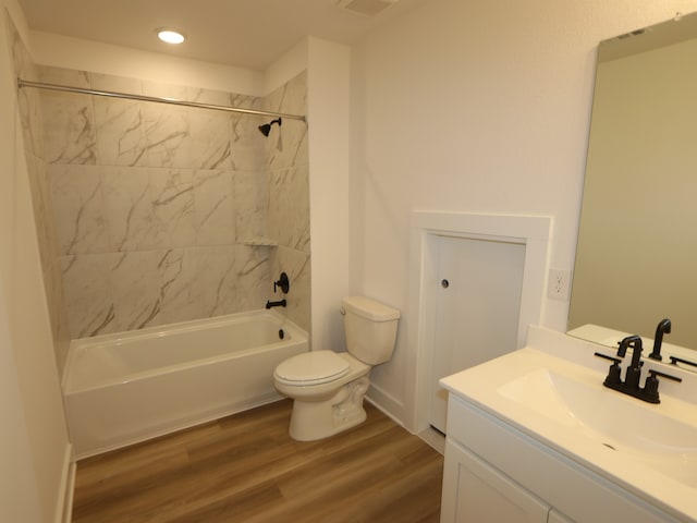 8518 Pier Cove Dr, Cypress, TX 77433 - bathroom featuring bathing tub / shower combination, vanity, wood finished floors, and recessed lighting