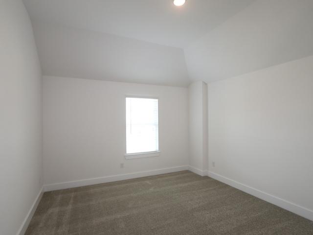 8518 Pier Cove Dr, Cypress, TX 77433 - bonus room featuring vaulted ceiling and carpet floors
