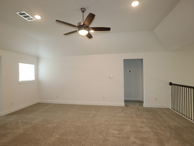 8518 Pier Cove Dr, Cypress, TX 77433 - spare room with lofted ceiling, light carpet, ceiling fan, and recessed lighting