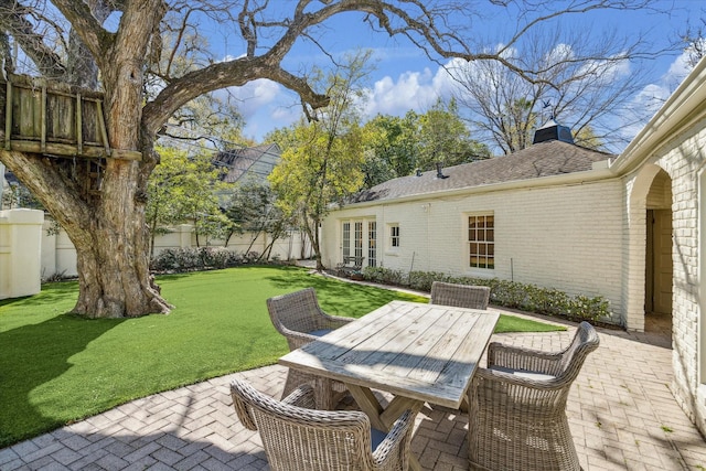 view of patio / terrace featuring outdoor dining area and a fenced backyard