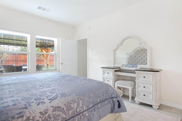 4918 Seaside Sparrow Ln, Baytown, TX 77521 - bedroom with visible vents and baseboards