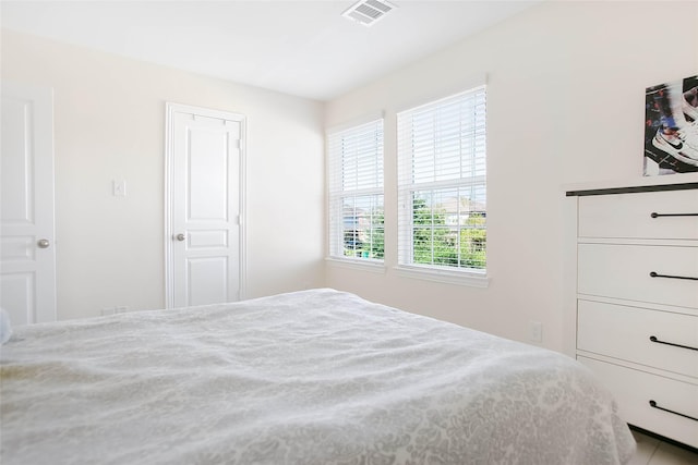 4918 Seaside Sparrow Ln, Baytown, TX 77521 - unfurnished bedroom featuring visible vents