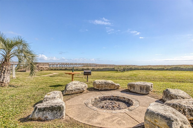 view of patio / terrace with a rural view and a fire pit