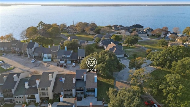 aerial view featuring a residential view and a water view