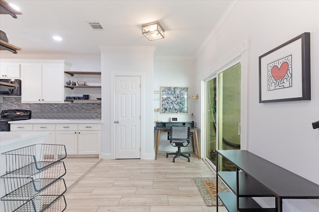 kitchen featuring visible vents, black appliances, tasteful backsplash, white cabinets, and light countertops