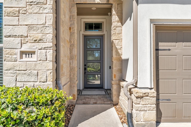 entrance to property with stone siding