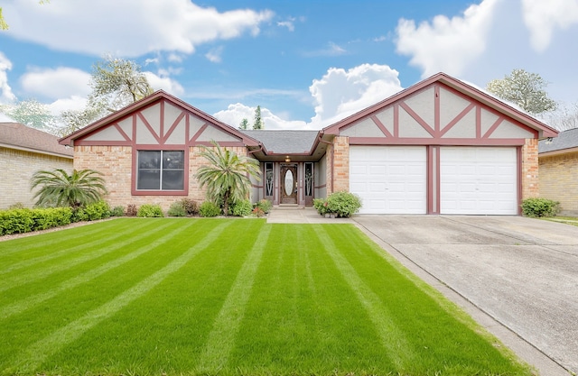 tudor house featuring a front lawn, concrete driveway, brick siding, and an attached garage