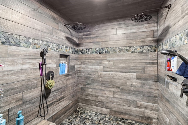 full bathroom featuring tiled shower