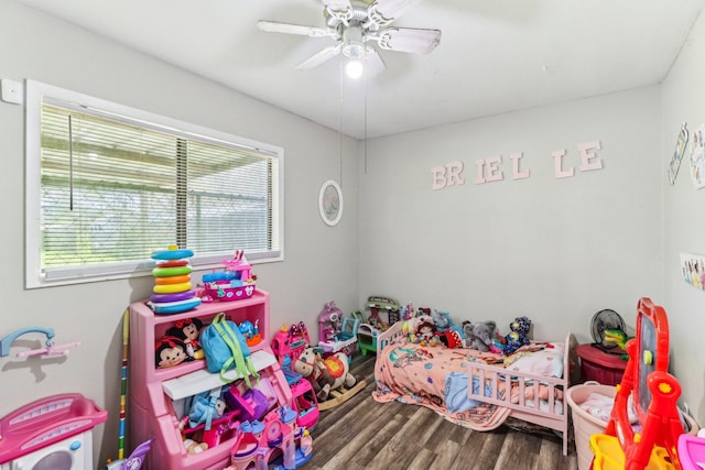 bedroom with ceiling fan and wood finished floors