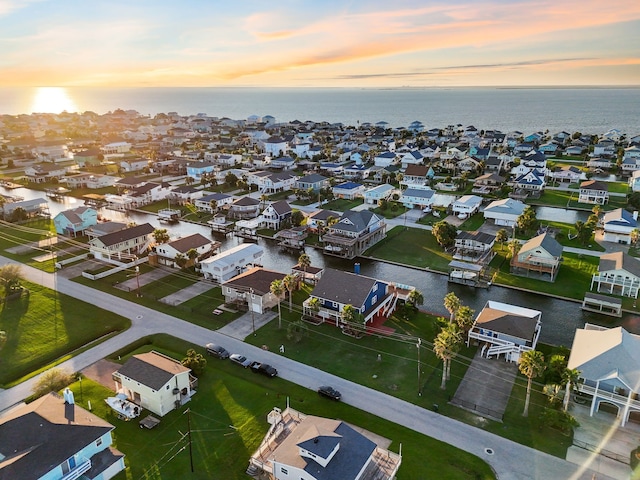 aerial view with a residential view and a water view