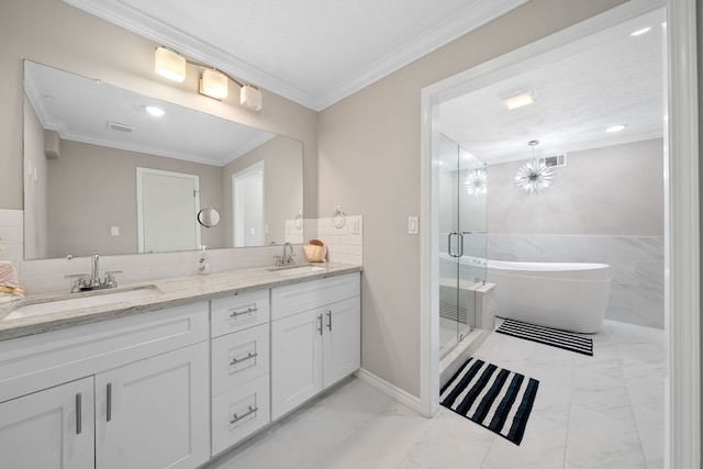 full bath with crown molding, double vanity, a stall shower, marble finish floor, and a sink