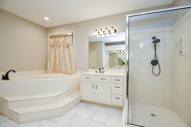 full bathroom with a garden tub, marble finish floor, a stall shower, recessed lighting, and vanity