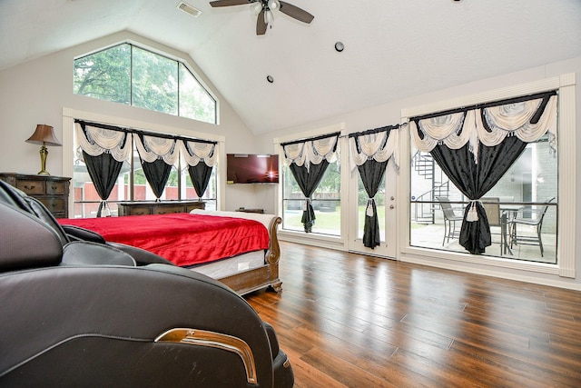 bedroom with visible vents, wood finished floors, high vaulted ceiling, a ceiling fan, and access to outside