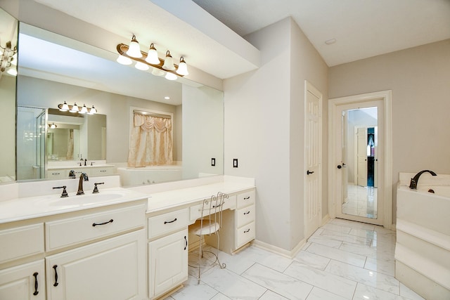 bathroom featuring a garden tub, marble finish floor, baseboards, walk in shower, and vanity