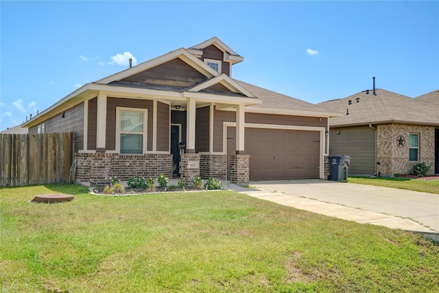 view of front facade featuring fence, driveway, a front lawn, a garage, and brick siding