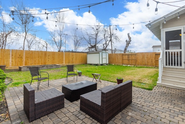 view of patio featuring a fenced backyard, an outdoor structure, outdoor lounge area, and a shed