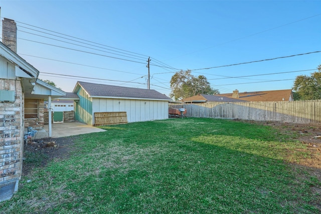 view of yard with a patio and fence