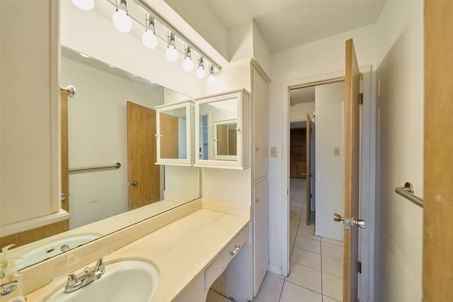 bathroom featuring tile patterned floors and vanity