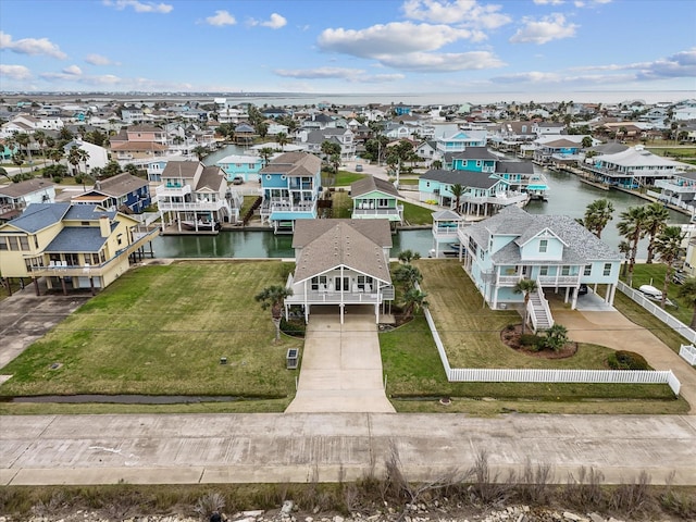 aerial view featuring a residential view and a water view