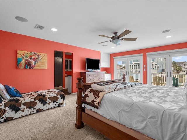 bedroom featuring access to outside, recessed lighting, carpet, and visible vents