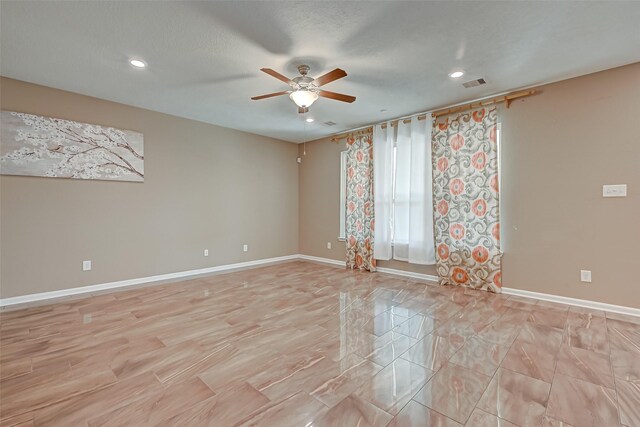 unfurnished room with a ceiling fan, recessed lighting, baseboards, and visible vents