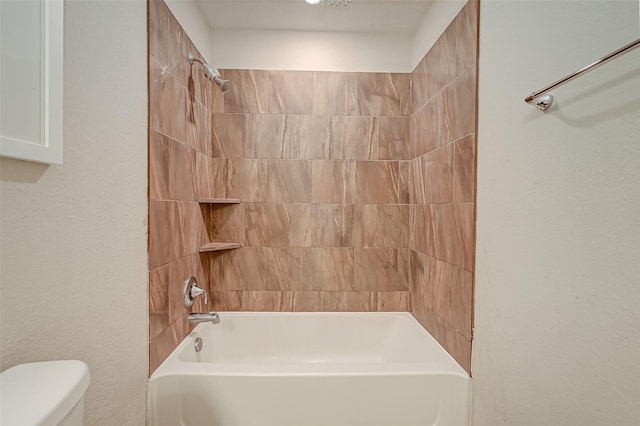 full bathroom featuring shower / bathing tub combination and toilet