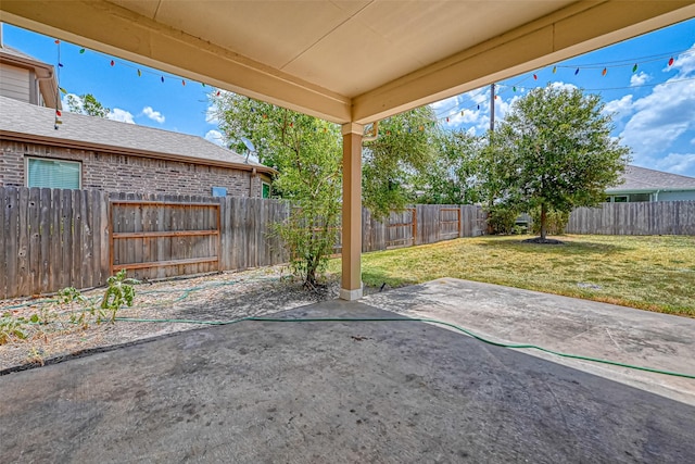 view of yard with a fenced backyard and a patio area